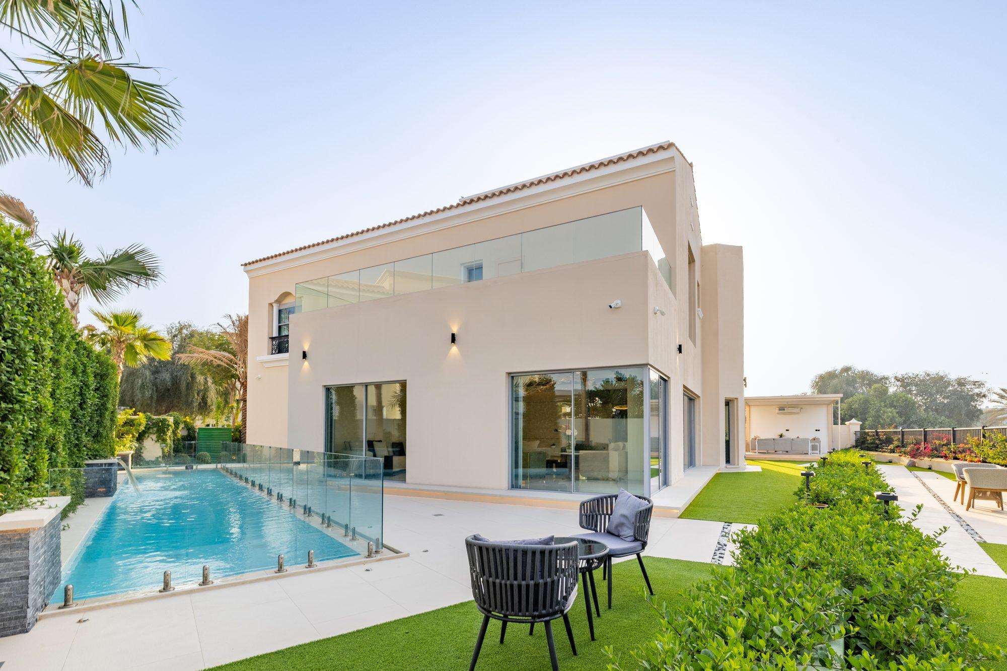 Renovated villa exterior with pool, terrace and landscaped garden, Arabian Ranches, Dubai — by Vocus Design & Build