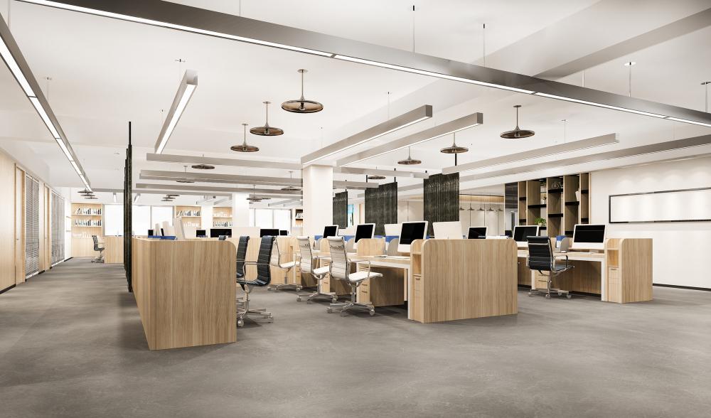 Completed open-plan office fit-out with timber workstation pods, linear lighting and acoustic screens