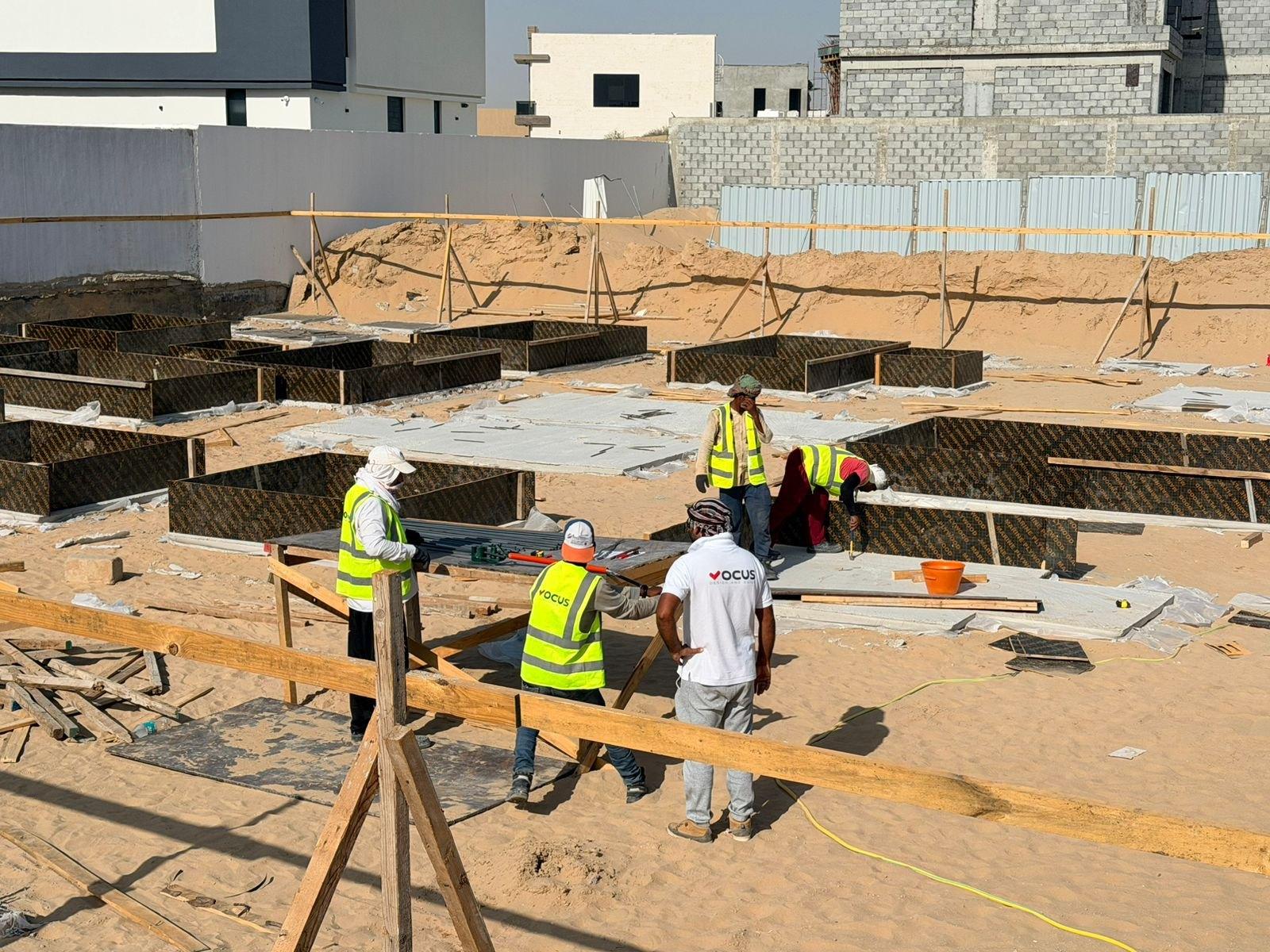Pad-footing shuttering set out across the excavated plot of a private villa, Al Aweer First, Dubai