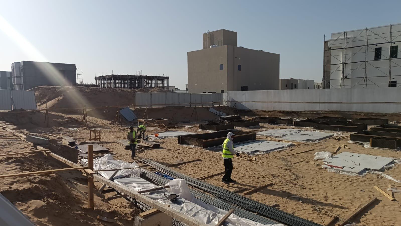 Foundation formwork and reinforcement laid out across the plot of a Vocus villa build, Al Aweer First, Dubai