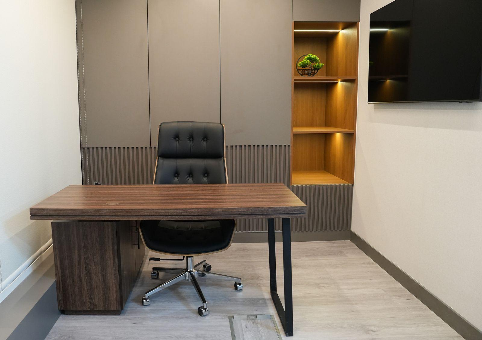 Completed office interior with bespoke joinery and integrated lighting — ITGS, Churchill Tower, Business Bay, Dubai